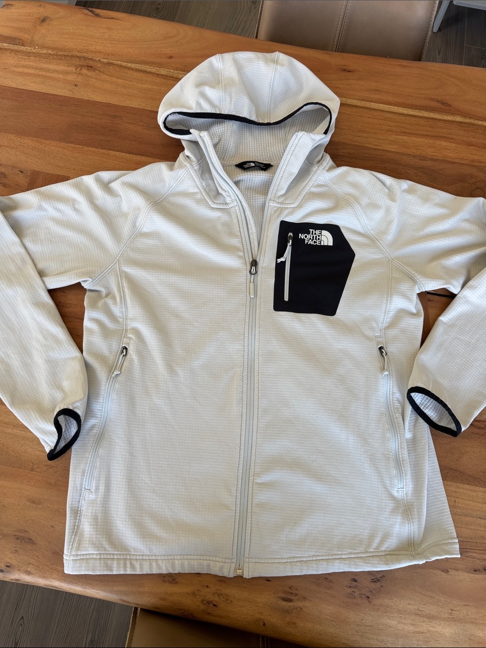 The North Face Light Grey Hooded Jacket with Black Chest Patch